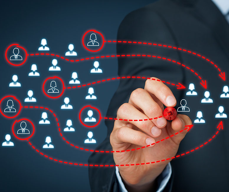 Man highlighting specific user icons from a larger pool, to depict filtering data